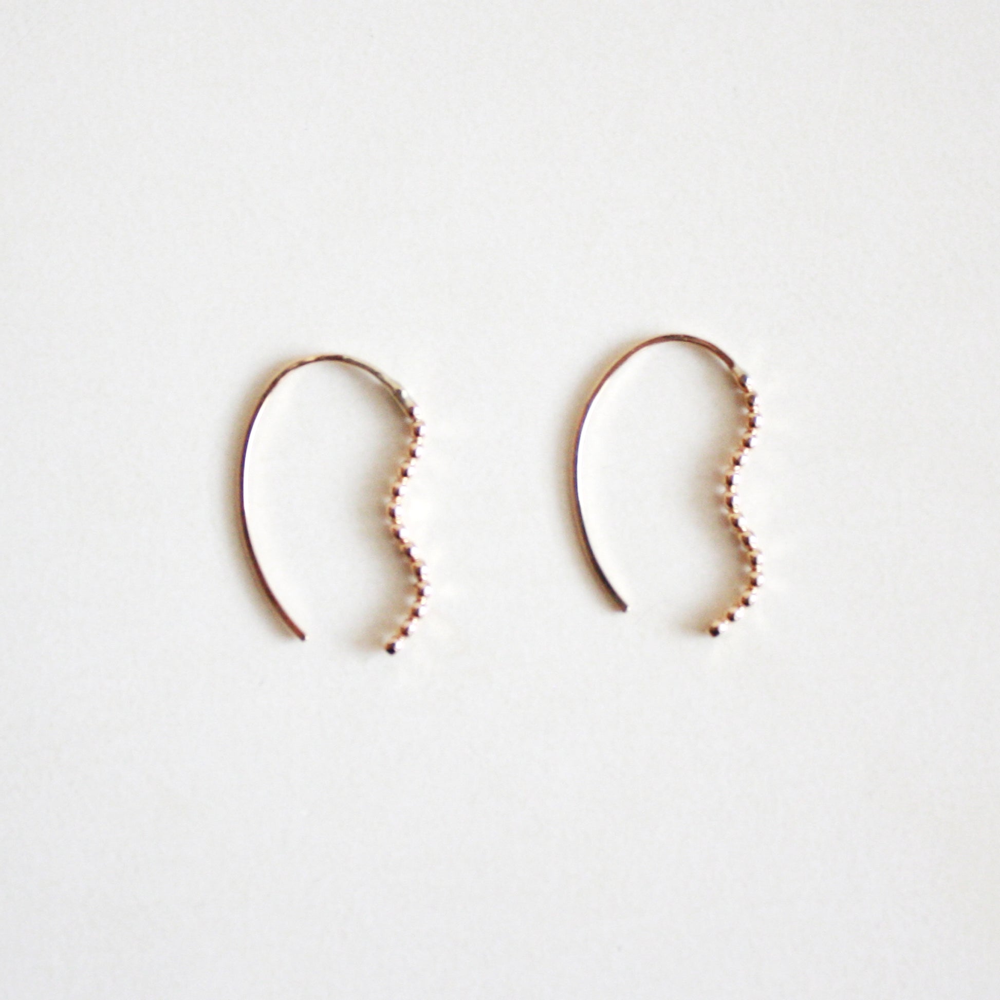 beaded wavy threader earrings gold